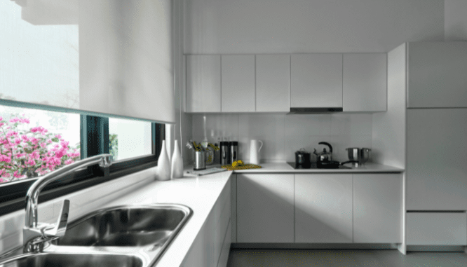 An image of a white kitchen used to demonstrate what a panel-ready appliance looks like.
