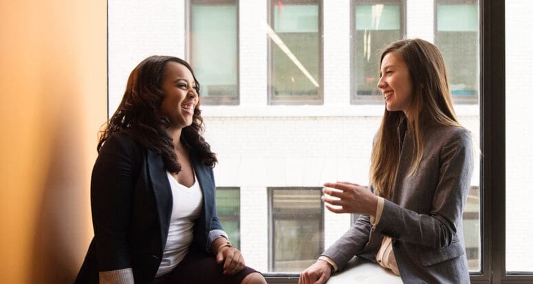 Real estate agent telling a story to a client.