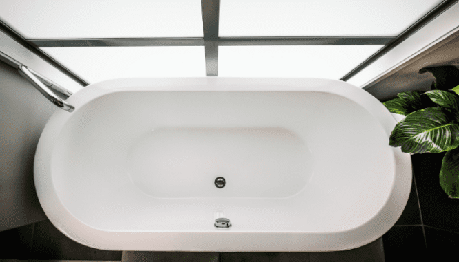 A soaking tub that was installed in a smart bathroom.