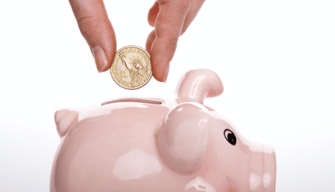 A coin gets deposited into a piggy bank while learning what happens when you sell a house for a profit.