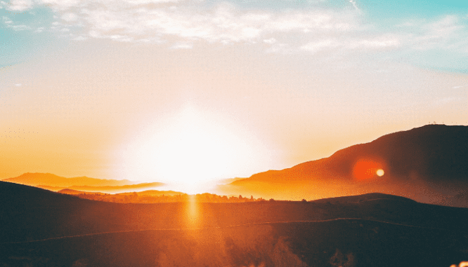 A setting sun that will impact a net-zero home.