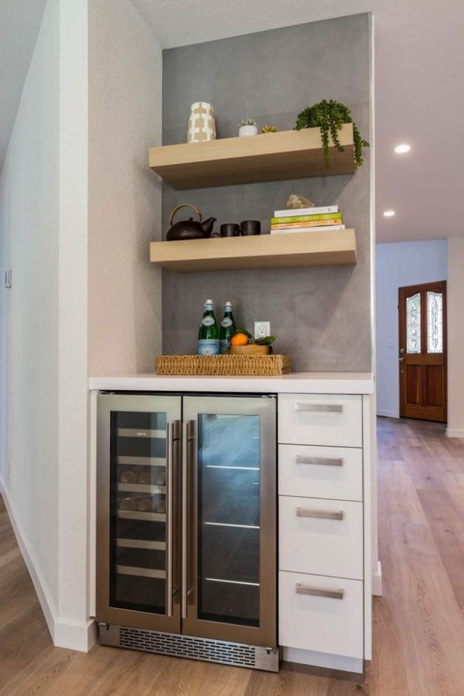 An open shelving bar in a house with modern interior design.