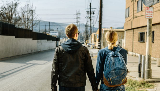 Two people heading to an open house without a realtor.