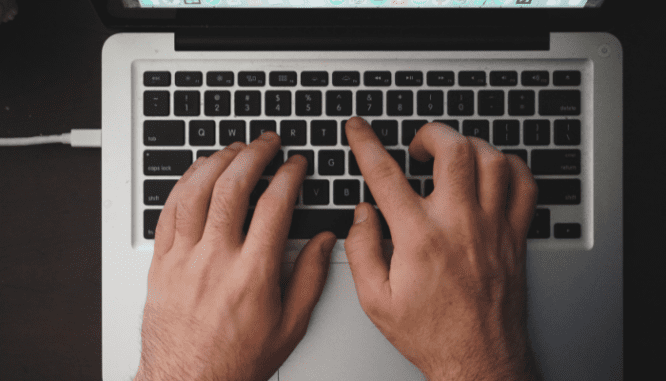 A person looking online at free home appraisals.