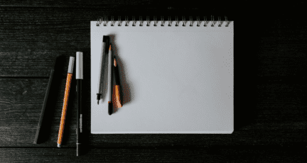 A notebook used to calculate average home maintenance costs.