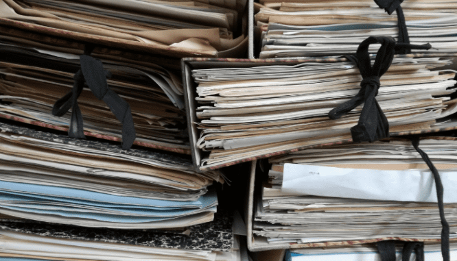 Binders full of by-laws for condo buildings.