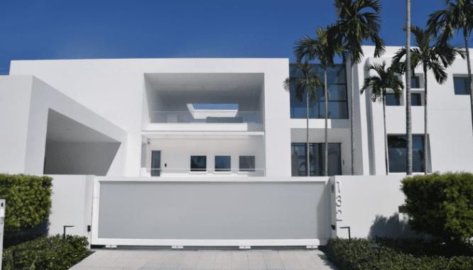 A white house displaying modernist architecture.