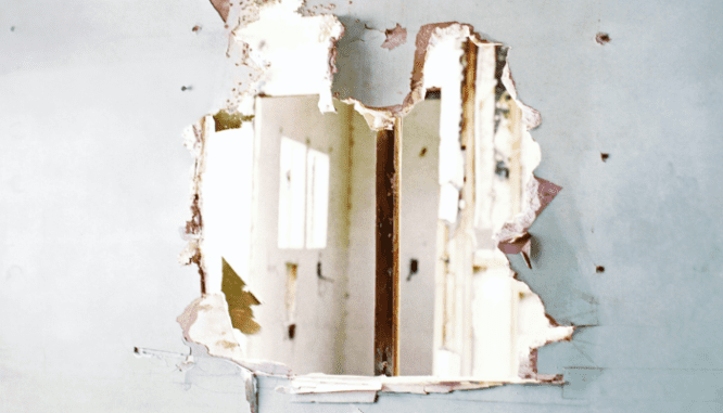 A vandalized wall in a home is something to discuss with a lender before closing.