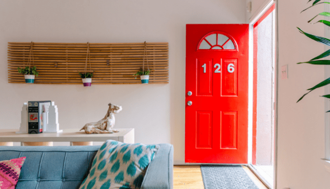 A freshly painted front door that is a great exterior home improvement.