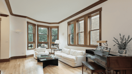 A room with wood trim that's paint has been removed.