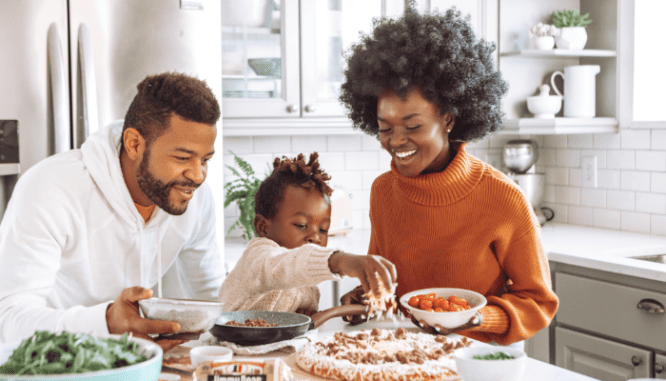 A family cooking in a home with adjustable mortgage.
