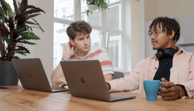 Two people discussing an appraisal gap guarantee.