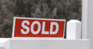 A sold sign for a house that might be a preforeclosure.