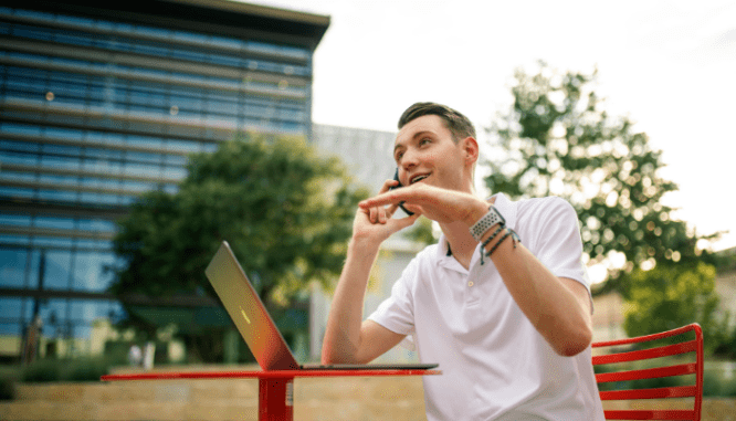A person talking on the phone about pricing their home to sell.