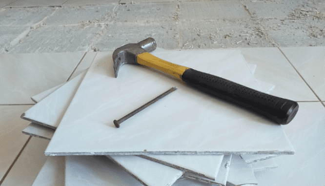 Floor tiles containing asbestos that are being removed before selling the house.