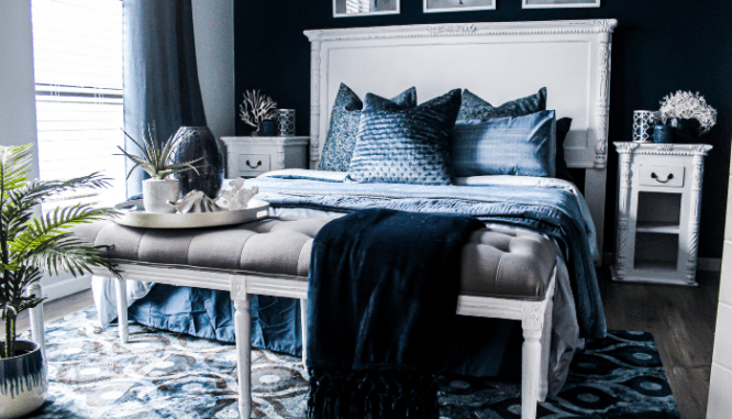 A blue bedroom, which might be a good bedroom color to sell a house.