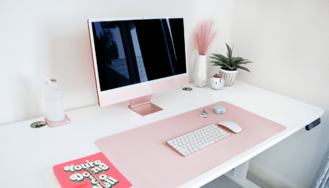 A computer used to decide between an iBuyer and a real estate agent.