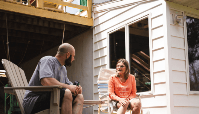 Two people discussing who pays for home inspection.