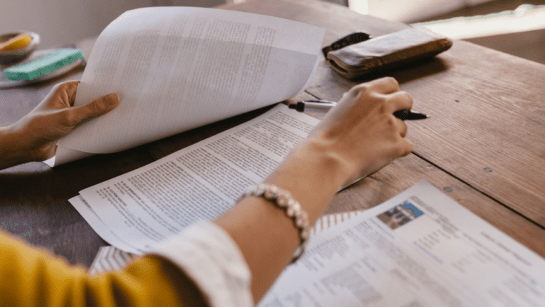 A buyer's agent termination letter being handed