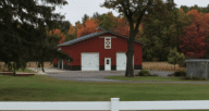 A red barn house in Wisconsin where the owner is wondering how to sell by owner.