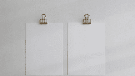 Papers on a desk that are used for seller's disclosure forms in Texas.