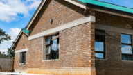 An image of a house with exposed foundation