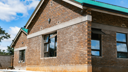 An image of a house with exposed foundation