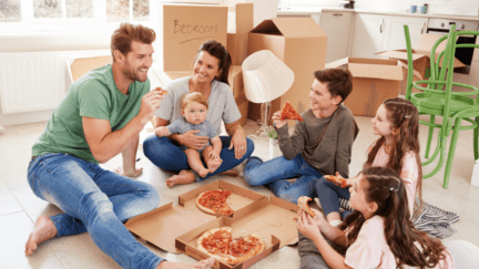 A family moving into a new house with the help of a checklist.