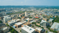 Aerial drone image of Downtown Alabama USA that represents We Buy Houses
