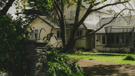 An image of a house that represents selling a house with a lien