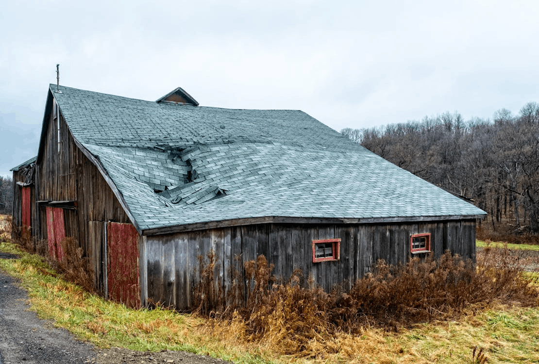 A photo of a home with roof damage
