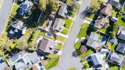 An image of a neighborhood which represents the summer housing market