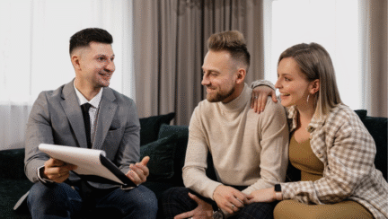A home buying couple asking mortgage questions to an expert