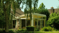 A sunroom with windows that cost money to build.