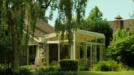 A sunroom with windows that cost money to build.