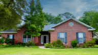Image of a house representing the removal of a home sale contingency without selling the current property.