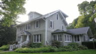 An image of a house in Michigan, where home sellers can find out who pays realtor fees